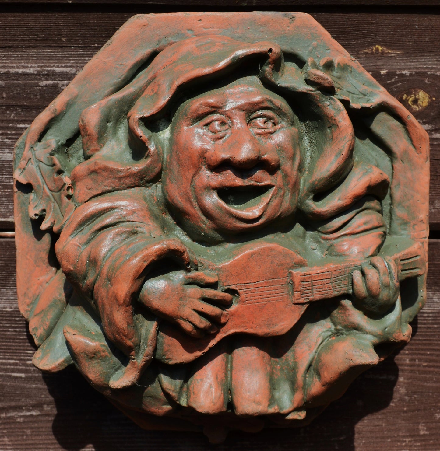 Guitar playing Medieval Monk