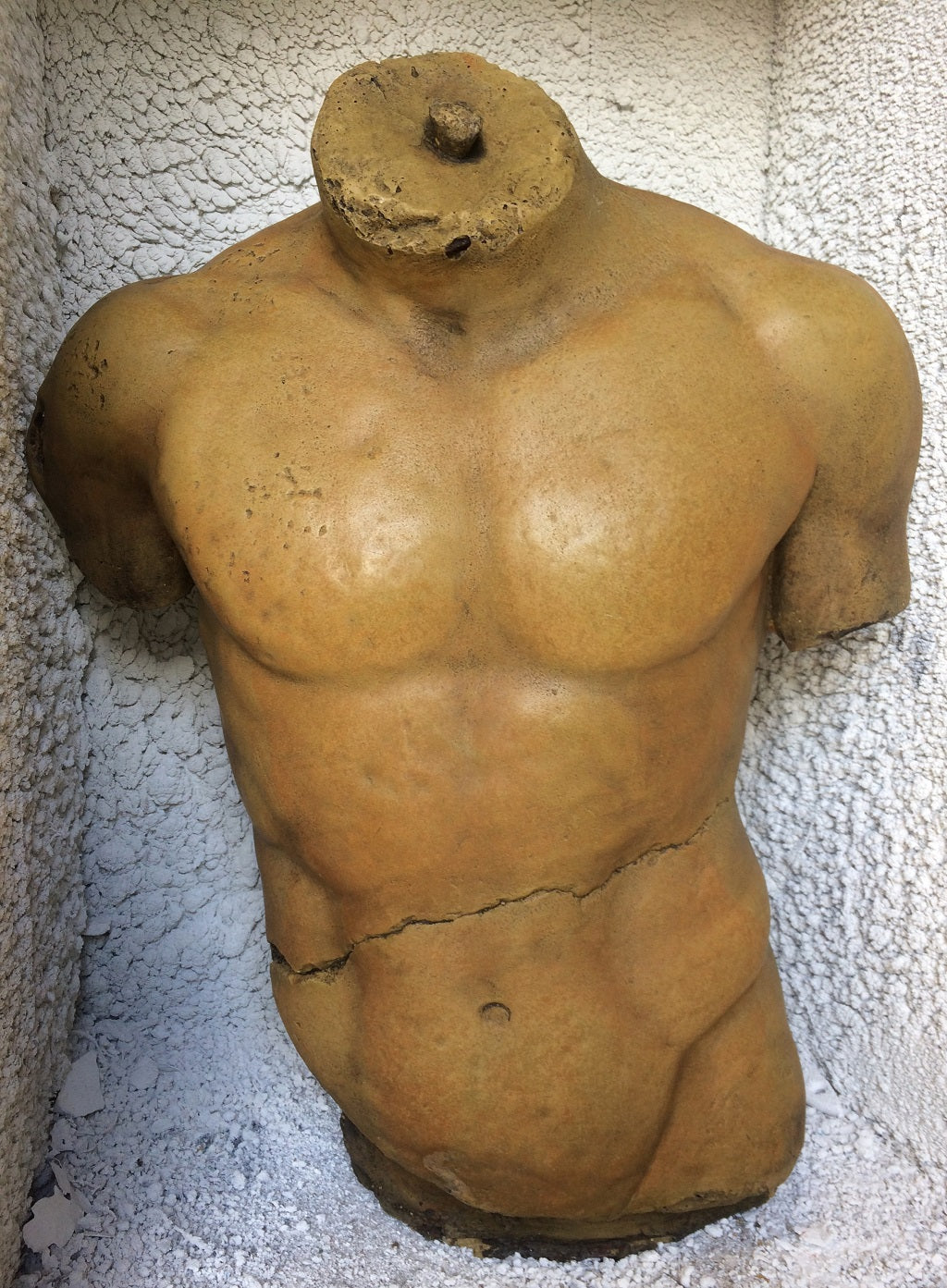 Male Torso Statue and Plaque