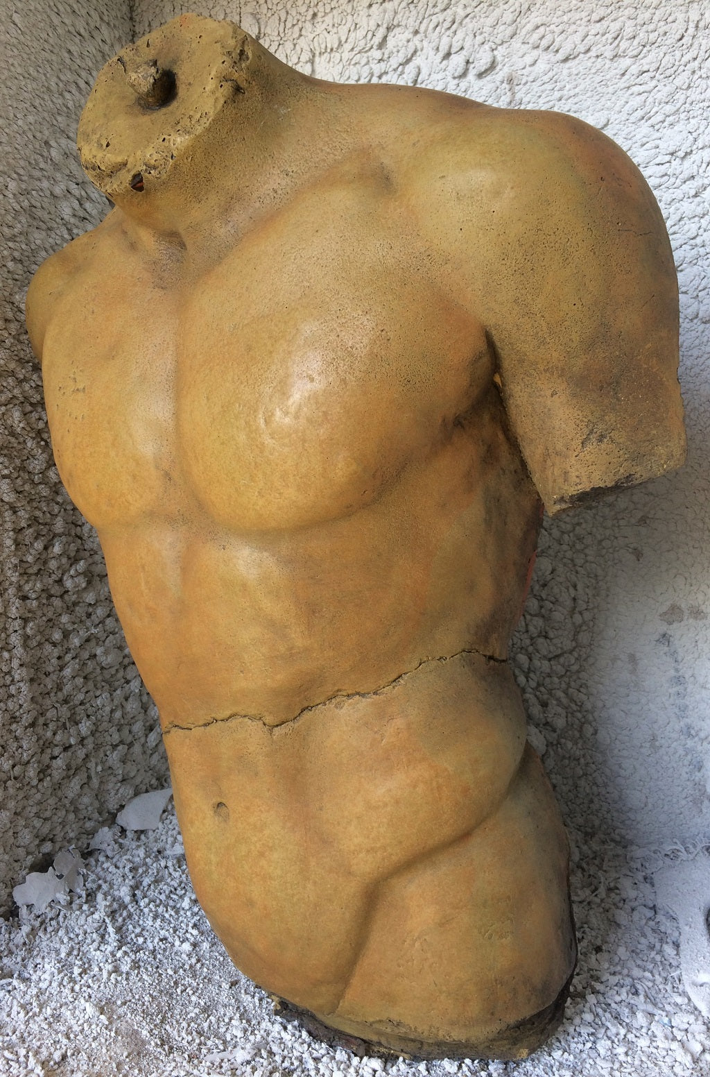 Male Torso Statue and Plaque