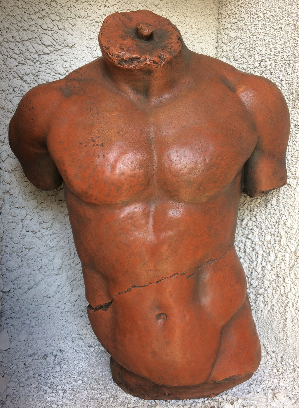Male Torso Statue and Plaque