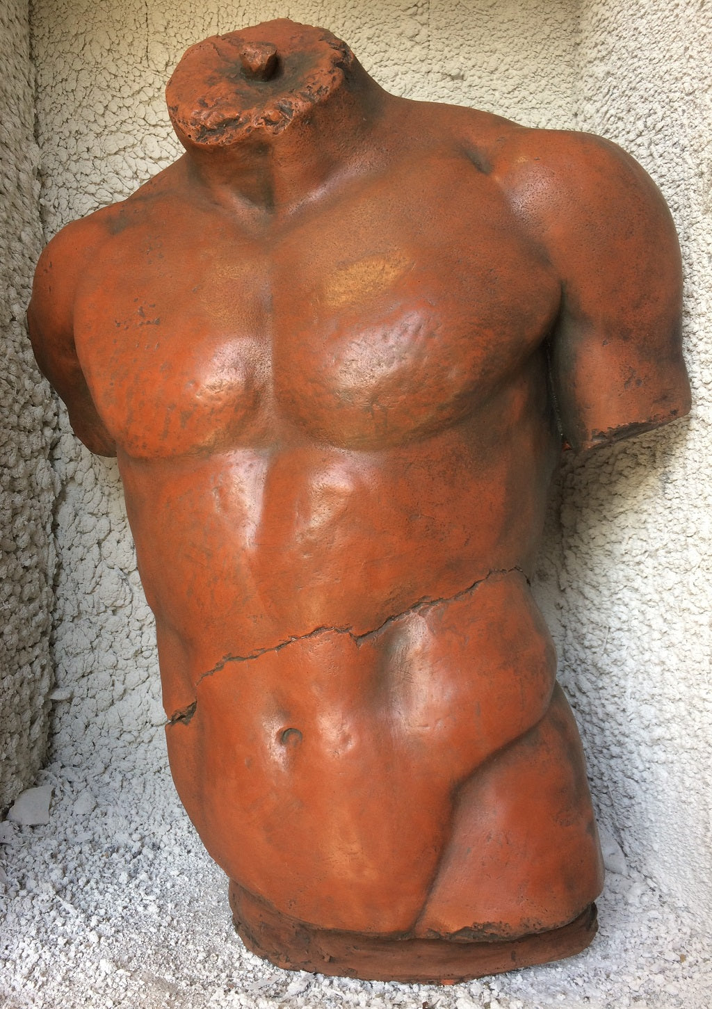 Male Torso Statue and Plaque