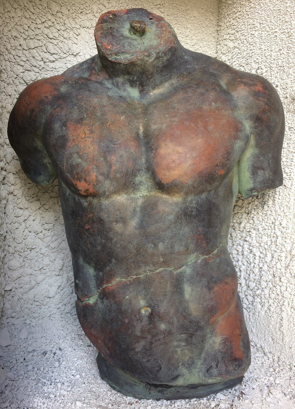 Male Torso Statue and Plaque