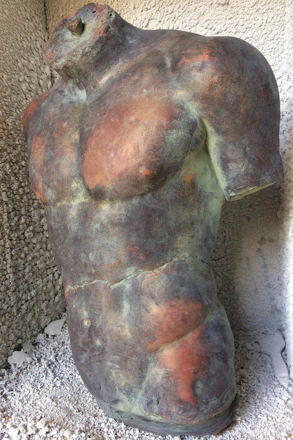 Male Torso Statue and Plaque