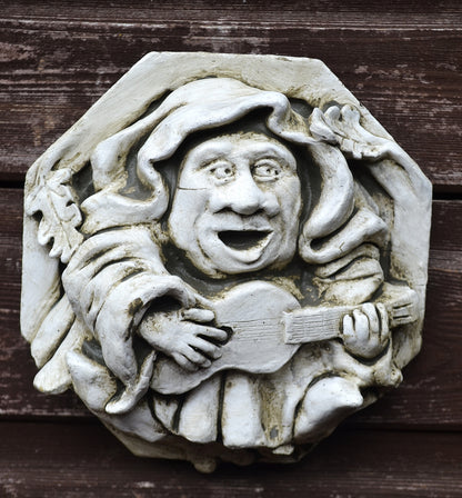 Guitar playing Medieval Monk