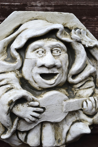 Guitar playing Medieval Monk