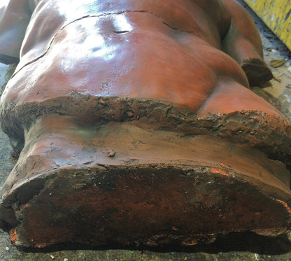 Male Torso Statue and Plaque