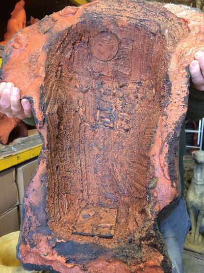 Male Torso Statue and Plaque